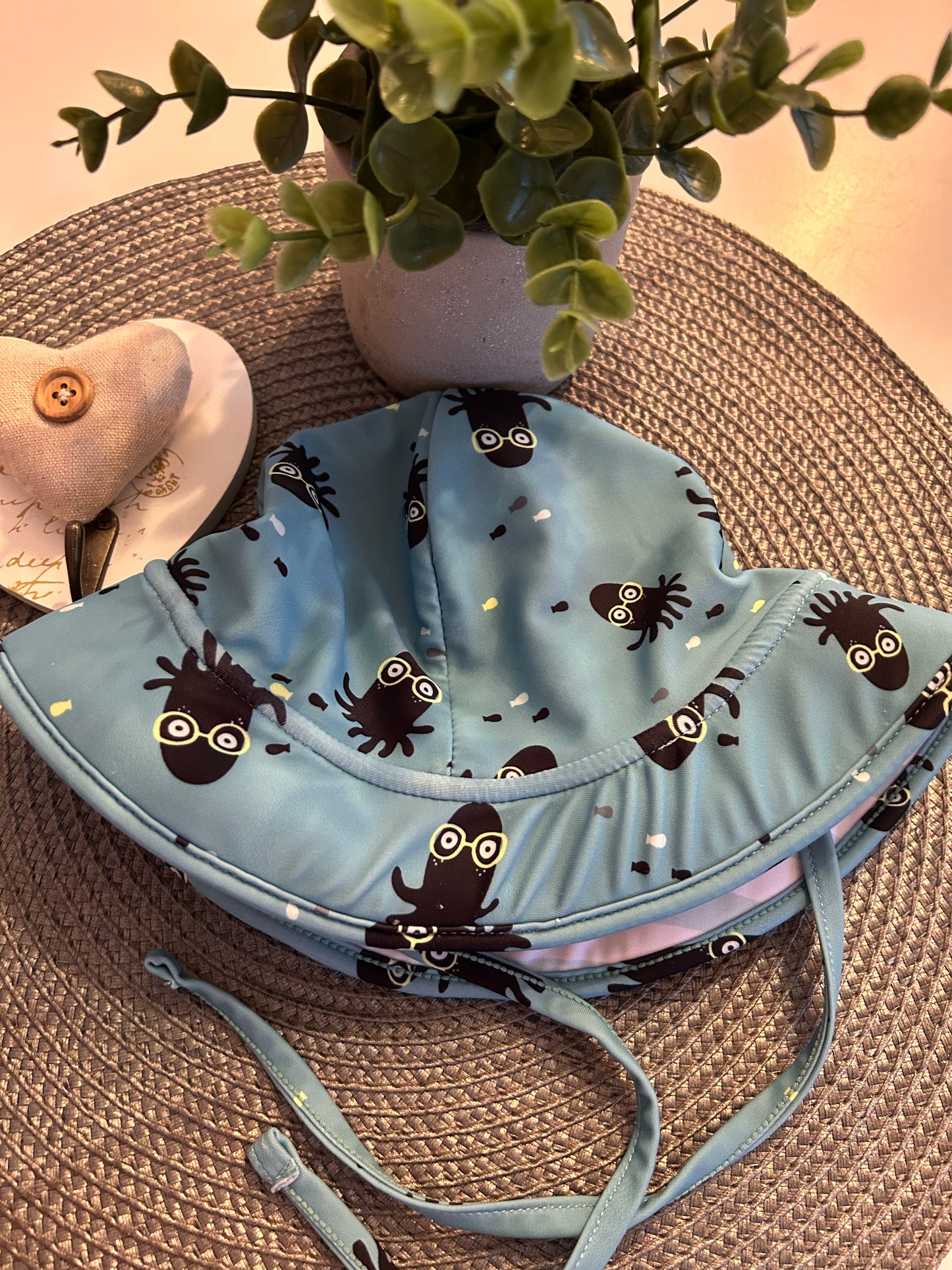 Chapeau réversible +- 6-12mois