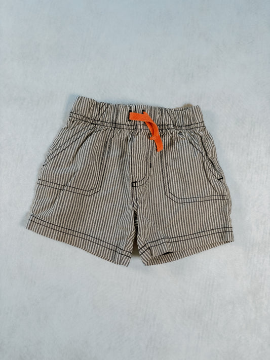 SHORT / Carter's 12 mois (fait petit, plutôt 6 mois)