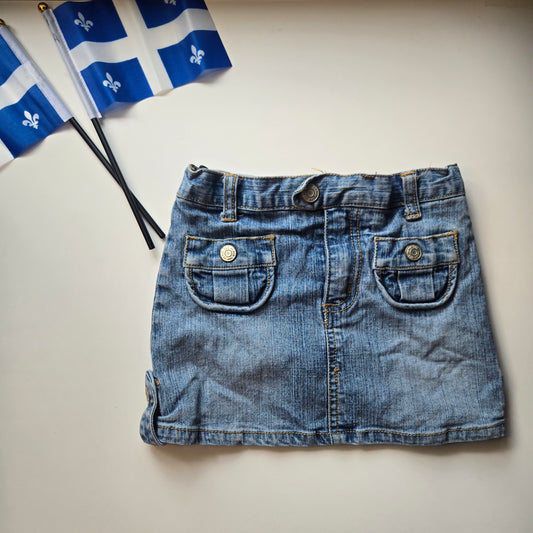 The children place *jupe short* 3T